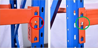 A rack safety pin securing a pallet rack beam to an upright frame